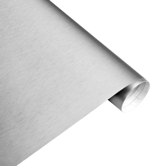 A close-up view of ChroMorpher Brushed Silver Vinyl roll with a satin texture, perfect for sleek automotive or interior styling applications.
