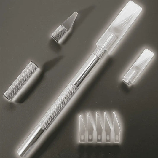 Precision cutting tool with additional blades from the ChroMorpher Professional Application Toolkit, ideal for detailed vinyl application work