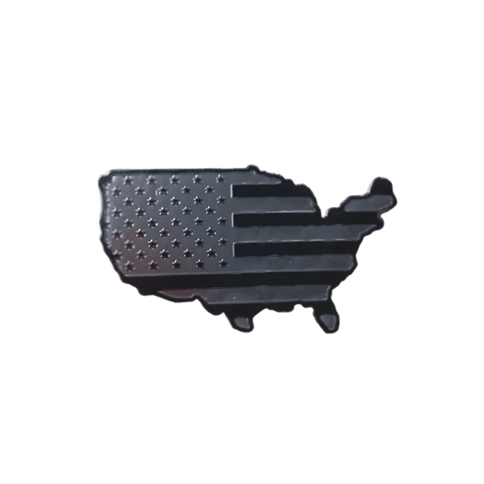 A blacked-out USA-shaped aluminum emblem sticker featuring a stealth American flag design. This durable, waterproof, and weatherproof metal badge is perfect for cars, motorcycles, trucks, laptops, and other smooth surfaces, providing a sleek, tactical, and patriotic look.