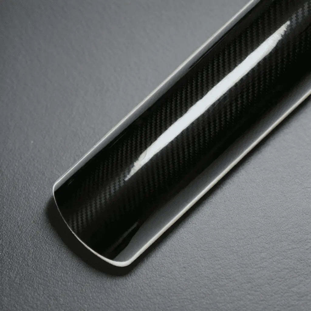 Close-up of Large ChroMorpher Carbon Fiber Roll with a glossy finish, highlighting its detailed carbon fiber texture for premium vehicle customization
