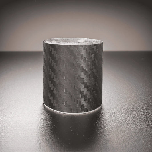 ChroMorpher Carbon Fiber Protective Tape roll displayed on a reflective surface.