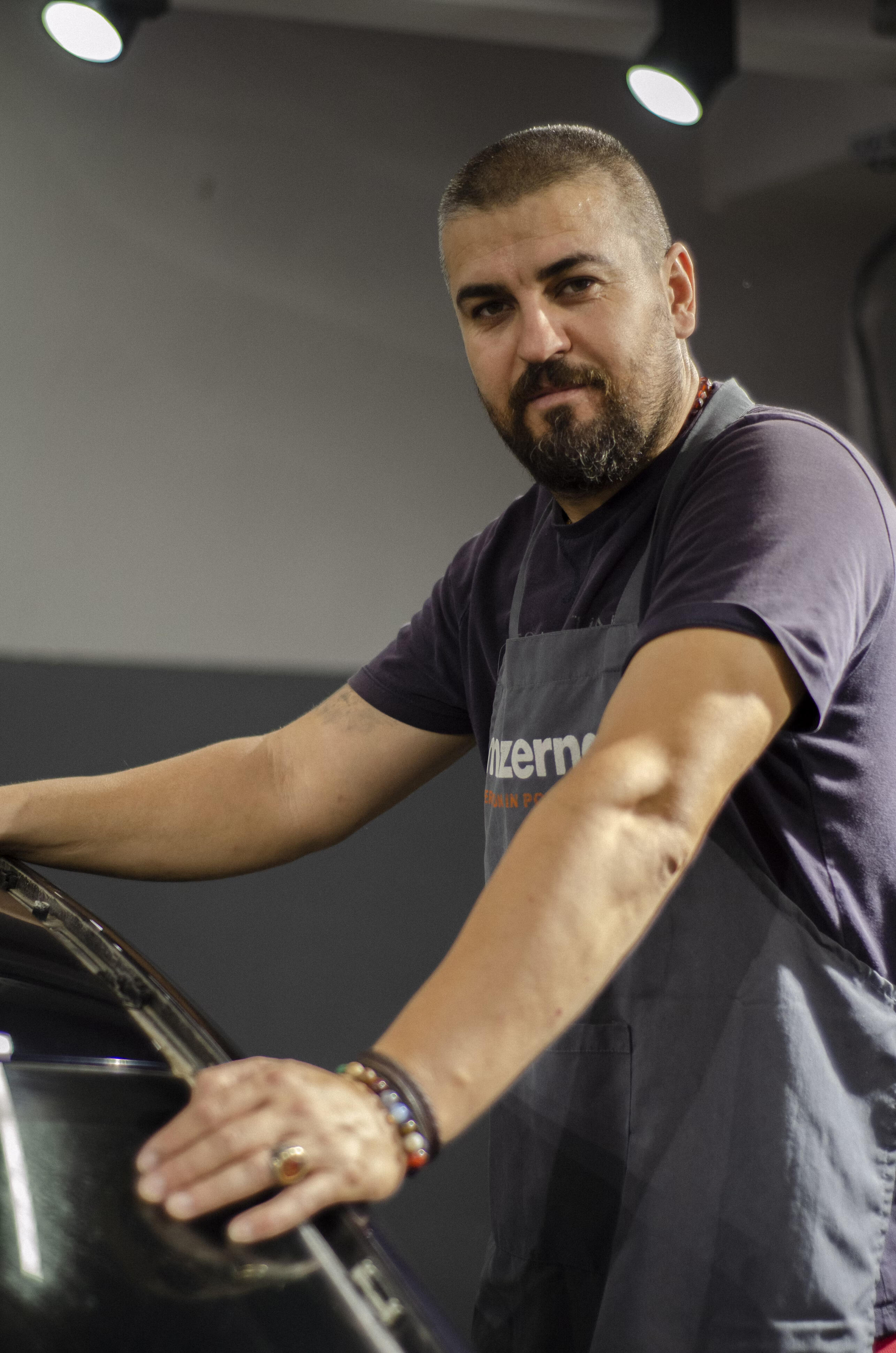 Experienced detailer in action – automotive chrome delete and customization expert. Professional detailer working on a car, showcasing confidence and expertise in vehicle customization.