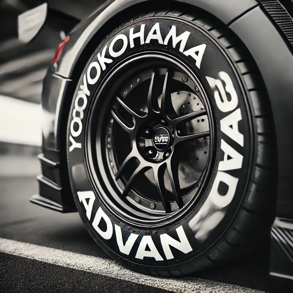 Car tire with ChroMorpher Yokohama Advan 3D Tire Lettering, bold white letters for a race-ready look.