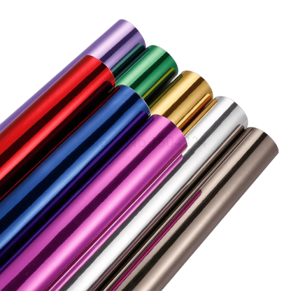 A collection of vibrant Chromorpher Chrome Mirror Vinyl rolls in various colors, including red, blue, green, gold, purple, silver, and bronze, showcasing their glossy, reflective finish perfect for vehicle and accessory customization.