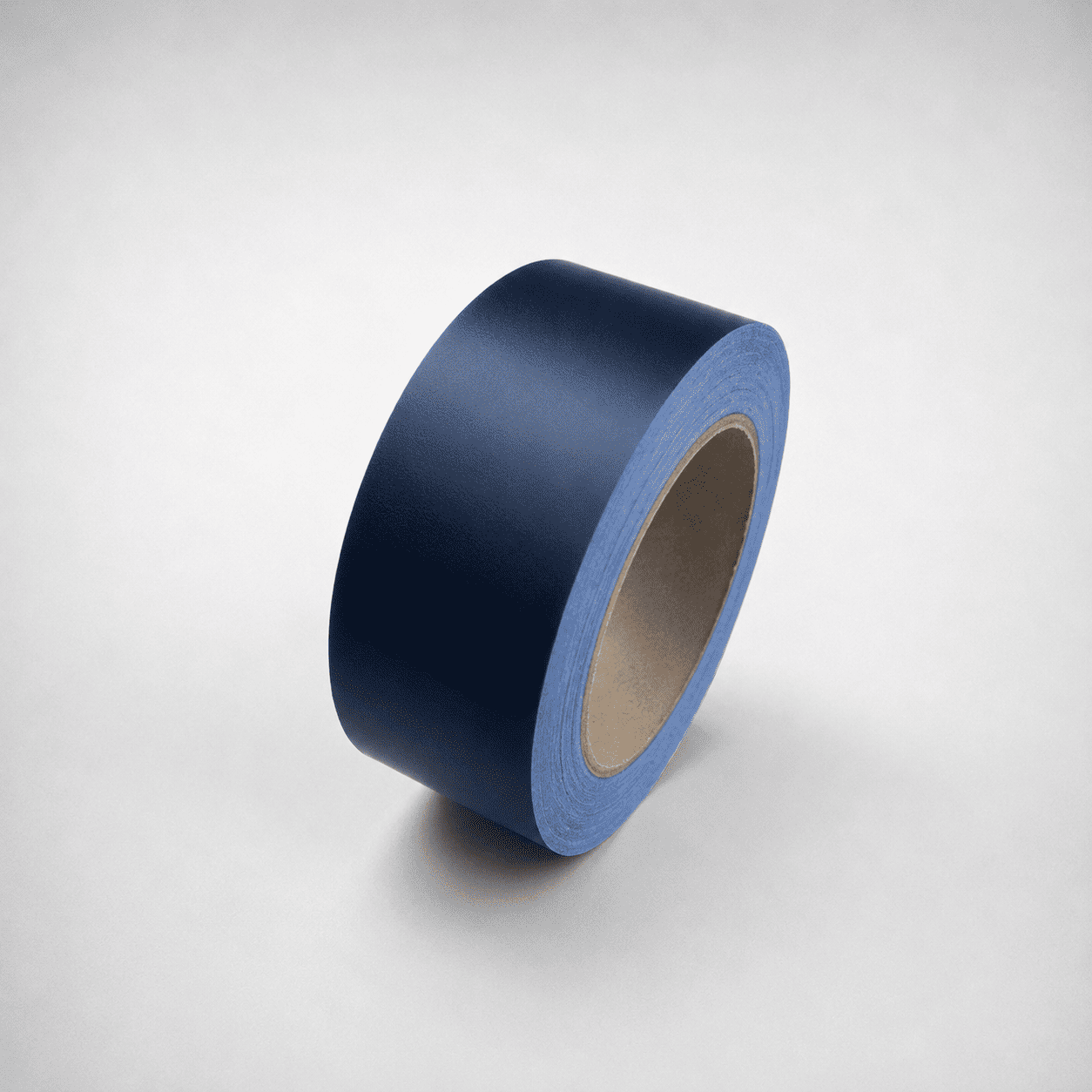 A roll of dark blue tape standing upright on its cardboard core against a light gray background.