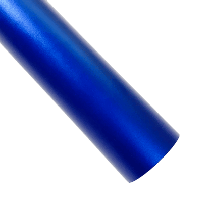 A vibrant blue ChroMorpher Ice Matte Vinyl strip with a satin matte chrome finish, ideal for automotive customization and creative DIY projects, displayed on a textured dark surface.