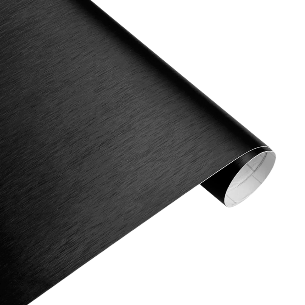 A detailed view of ChroMorpher Brushed Black Vinyl roll, featuring a matte satin finish, ideal for elegant car wraps and interior enhancements.