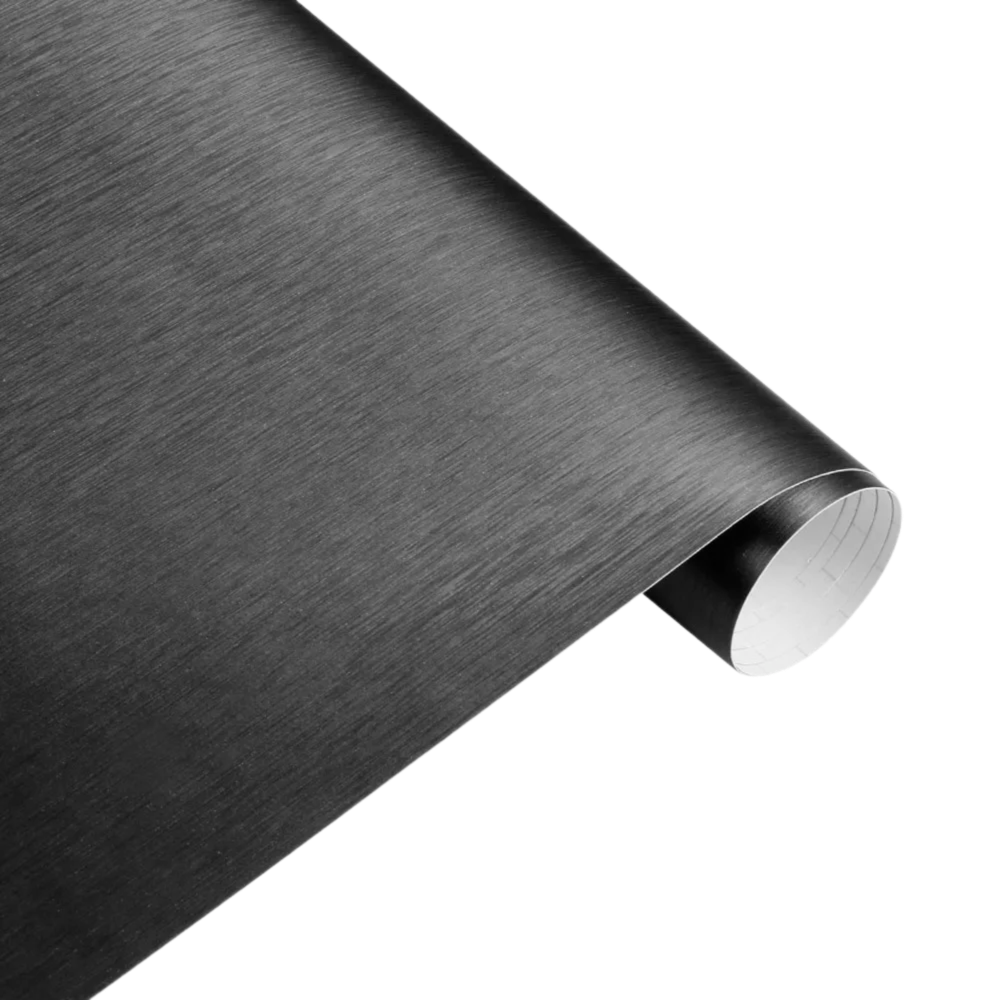 ChroMorpher Brushed Dark Gray Vinyl roll featuring a refined matte texture, perfect for sophisticated vehicle wraps and modern styling projects.