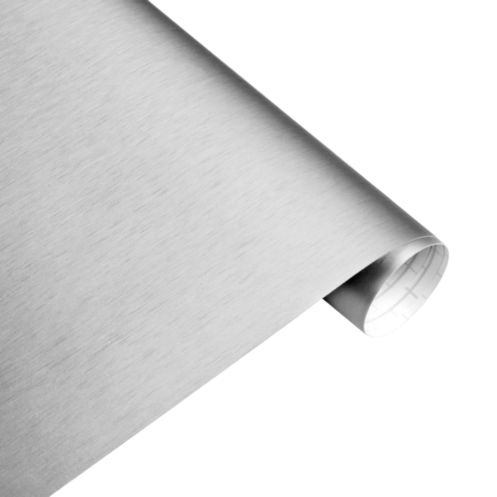 A close-up view of ChroMorpher Brushed Silver Vinyl roll with a satin texture, perfect for sleek automotive or interior styling applications.