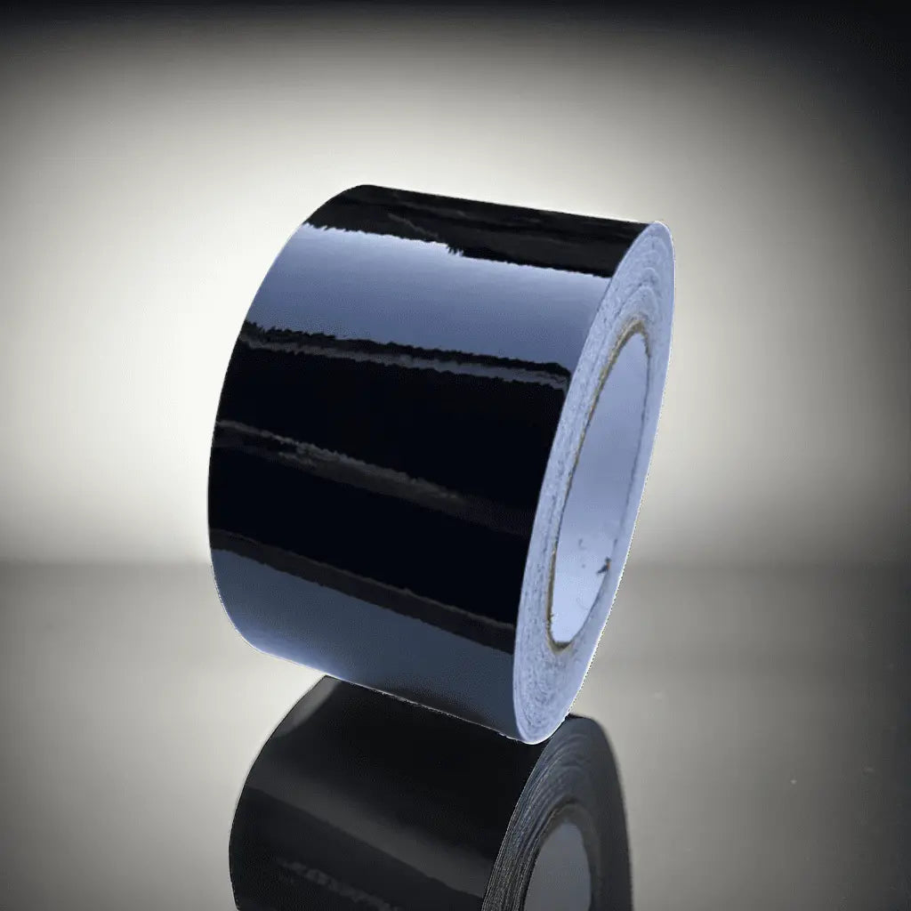 Roll of ChroMorpher Glossy Chrome Delete Tape with a high-gloss finish, ideal for achieving a seamless, modern look by covering chrome accents.