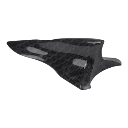 A carbon fiber shark fin spoiler designed for aerodynamic enhancement and stylish vehicle modification. Features a sleek carbon fiber pattern finish, ideal for improving downforce and reducing drag. Perfect for universal car applications, including sports cars, sedans, and SUVs.