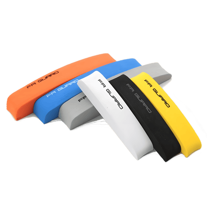 A close-up view of ChroMorpher Protective FR Guard Car Mouldings in orange, blue, grey, yellow, and black colors