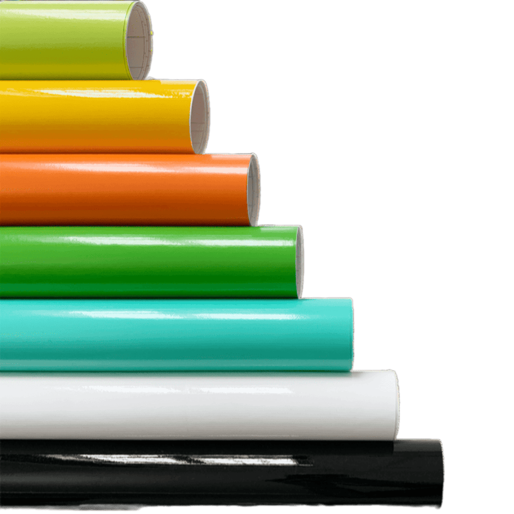 A vibrant stack of ChroMorpher Gloss Vinyl Rolls arranged in layers of lime, yellow, orange, green, teal, white, and black, showcasing their high-gloss finish and versatile application.