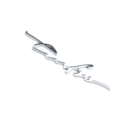 A close-up of the silver "Turbo" 3D emblem badge made from high-quality zinc alloy. The stylish and sleek design is perfect for adding a race-inspired look to your vehicle's interior and exterior surfaces. This durable, self-adhesive car sticker is ideal for customizing your car's body, windows, and bumpers with an eye-catching, metallic shine.