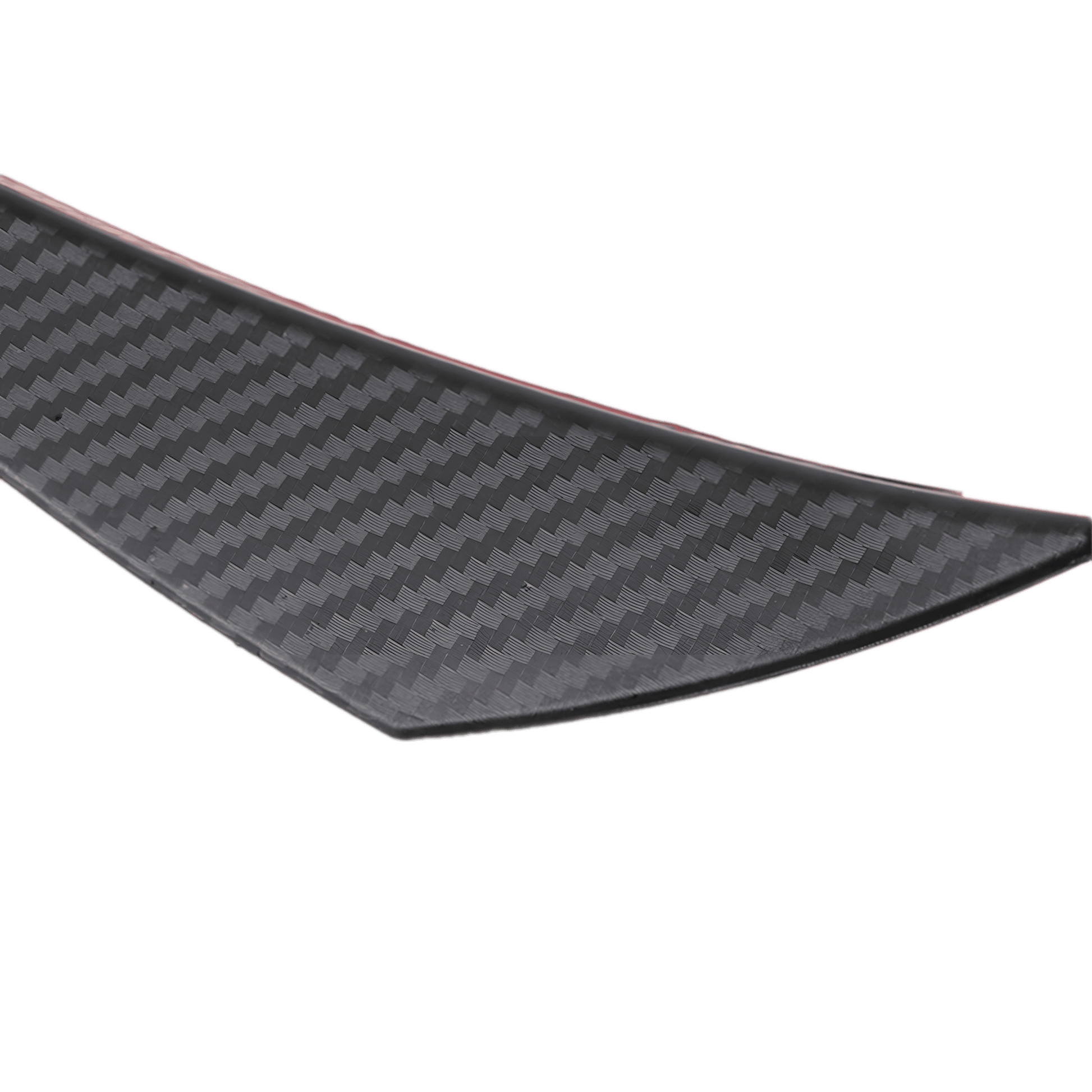 A detailed close-up view of a carbon fiber-style rear bumper diffuser fin, showcasing its sleek texture, aerodynamic design, and red adhesive backing for easy installation. The high-quality material enhances a vehicle's sporty appearance while improving aerodynamics.