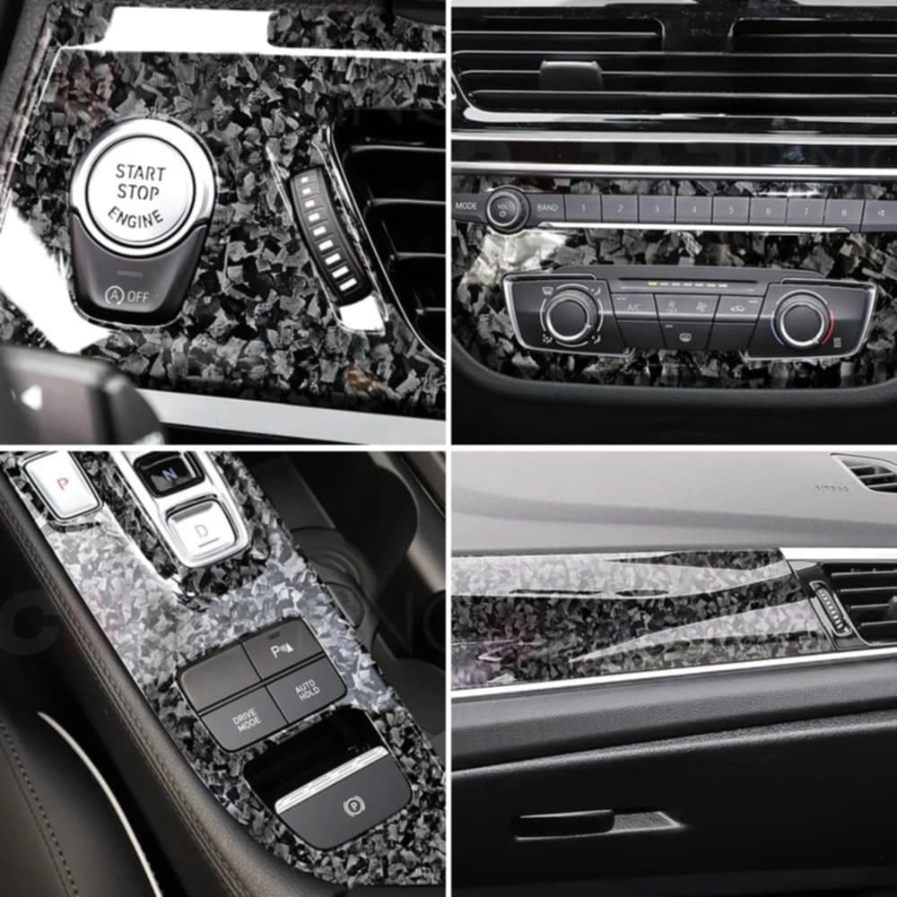 A car interior customized with Glossy Forged Carbon Fiber Vinyl Wrap in a black forged carbon pattern. The wrap is applied to key areas including the start-stop engine button surround, dashboard trim, center console, and air conditioning controls, showcasing a sleek, high-gloss finish and premium design upgrade.
