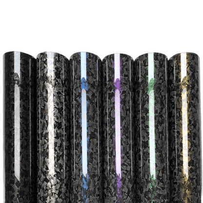 A display of Glossy Forged Carbon Fiber Vinyl Wrap rolls in various colors, including black, silver, blue, purple, green, and gold. Each roll showcases a high-gloss forged carbon fiber finish, perfect for car customization and DIY projects. The premium PVC material ensures durability, flexibility, and a sleek, professional appearance.