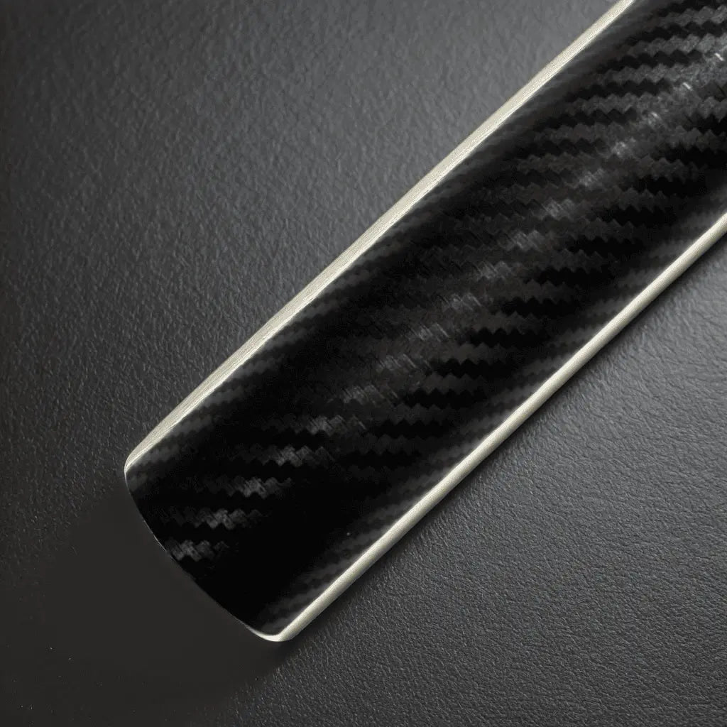 Close-up of the Large ChroMorpher Carbon Fiber Roll with a smooth, glossy finish and detailed carbon fiber pattern, perfect for automotive customizations.