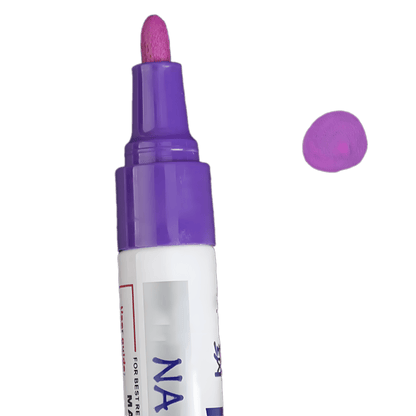 A close-up image of a purple permanent tire paint marker with a thick tip, designed for customizing tire lettering. A swatch of purple paint is displayed beside the marker to showcase the actual color output.