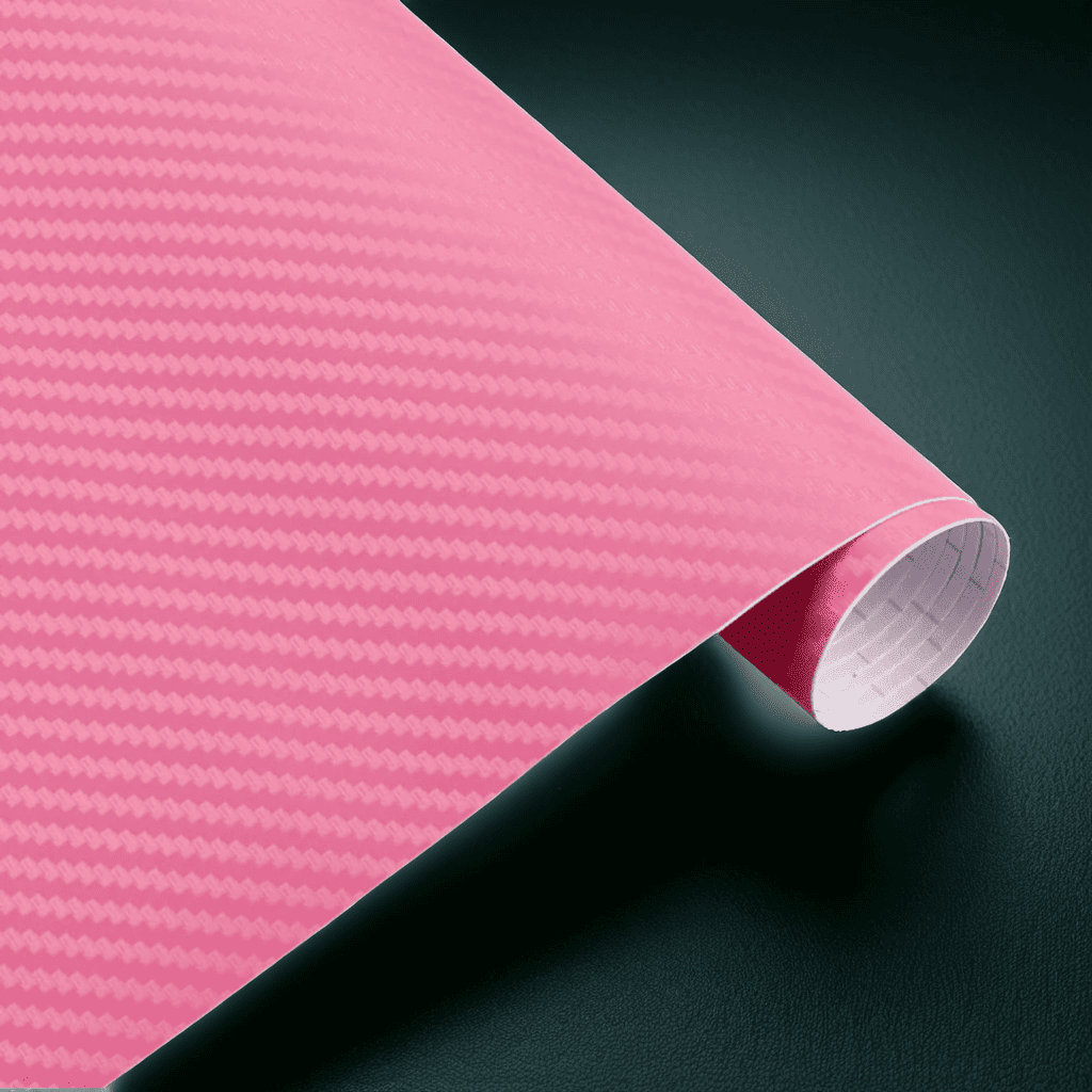 A roll of ChroMorpher carbon fiber vinyl in pink, featuring a bold and realistic 3D carbon fiber texture, perfect for adding a stylish and eye-catching finish to vehicles or other surfaces.