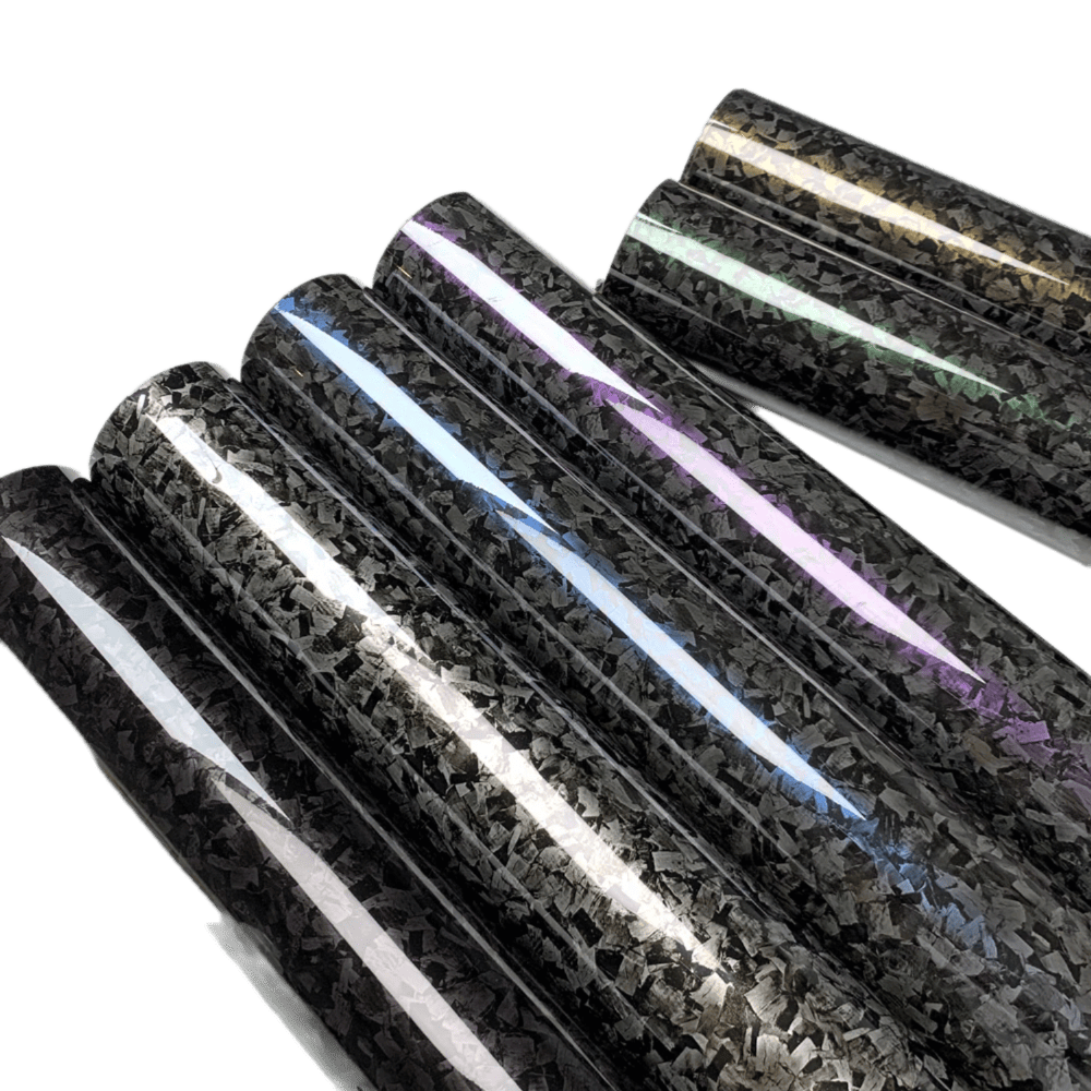 An angled view of Glossy Forged Carbon Fiber Vinyl Wrap rolls in multiple vibrant colors, including black, silver, blue, purple, green, and gold. Each roll features a sleek, high-gloss forged carbon finish, showcasing the premium quality and professional-grade look ideal for car and accessory customization.