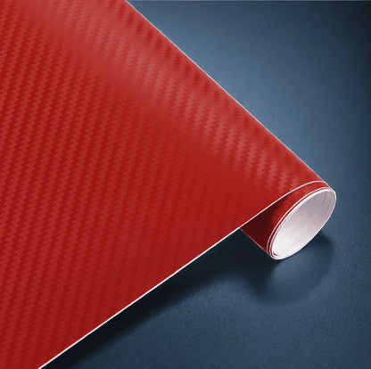 A roll of ChroMorpher carbon fiber vinyl in red, featuring a bold and realistic 3D carbon fiber texture, ideal for adding a striking and dynamic finish to vehicles or other customizable surfaces.