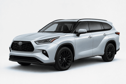A silver Toyota Highlander SUV with black wheels, shown from a three-quarter front angle on a light gray studio background.