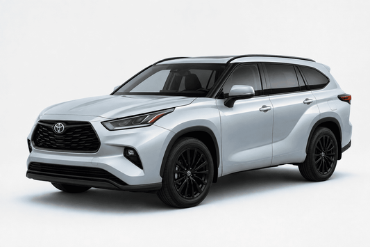 A silver Toyota Highlander SUV with black wheels, shown from a three-quarter front angle on a light gray studio background.