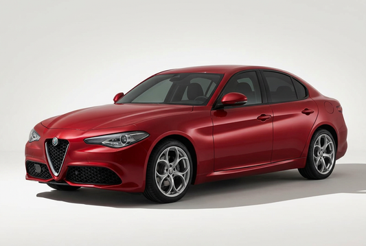 Alfa Romeo Giulia (2016–2025) shown from a front three-quarter angle on a light studio background.