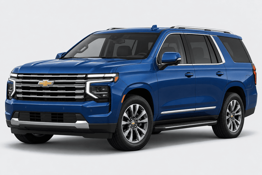 A blue Chevrolet Grand Cherokee SUV shown from a three-quarter front angle on a light gray studio background.