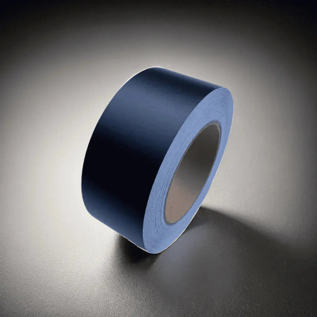 Roll of Matte ChroMorpher Chrome Delete Tape, showcasing a deep, smooth, non-reflective surface suitable for minimalistic car detailing