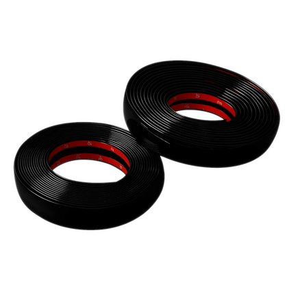 Two glossy black ChroMorpher Clip-On Trim Cover 2.0 rolls showing the smooth high-gloss finish and red adhesive backing