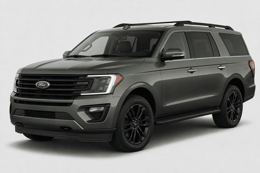 A dark gray Ford Expedition MAX SUV with black wheels, black roof rails, and a black front grille, shown from a three-quarter front angle on a light gray studio background.