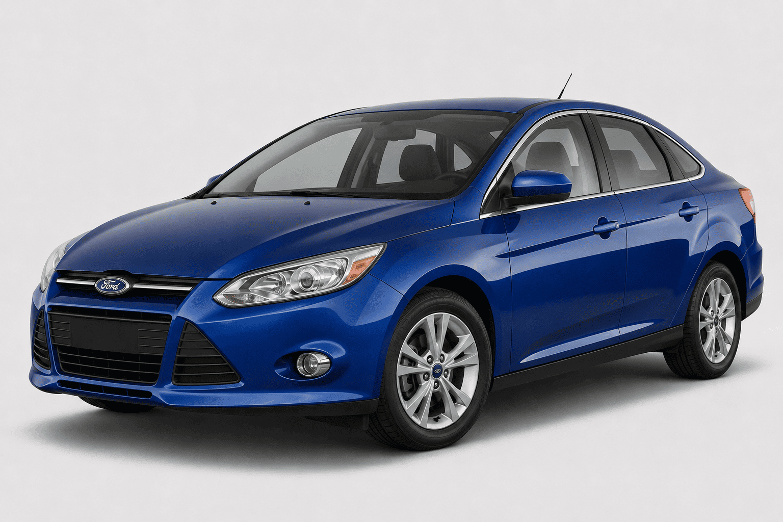 A blue Ford Focus sedan photographed at a three-quarter front angle on a light gray studio background.