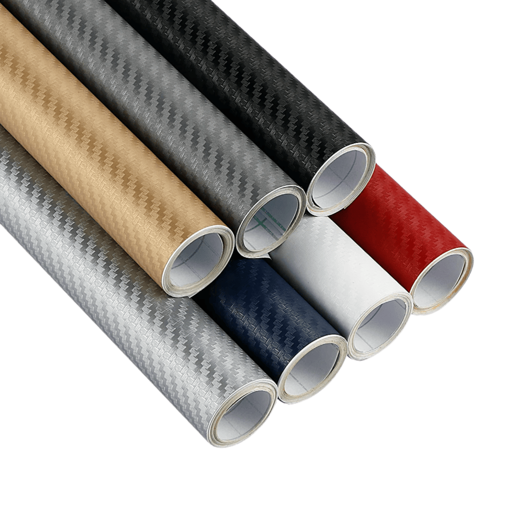 Assorted ChroMorpher Wide Carbon Vinyl rolls, featuring shades of grey, silver, black, and red. Perfect for car customization and interior upgrades with a smooth, carbon texture.
