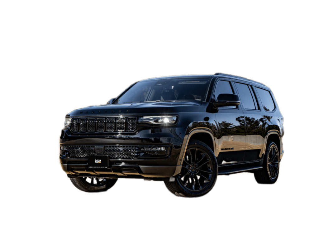 Black SUV with chrome accents and a glossy finish, showcasing modern styling with silver wheels and a premium front grille.