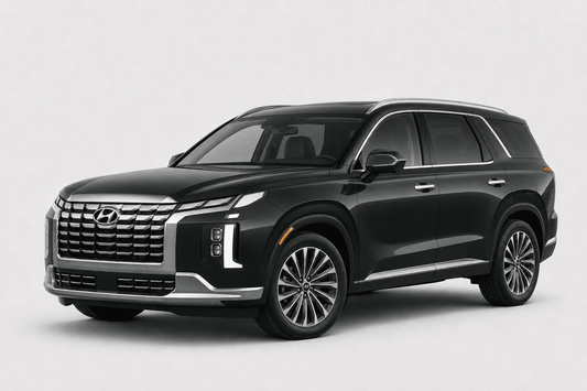 A black Hyundai SUV with chrome accents, shown from a three-quarter front angle against a light gray studio background.