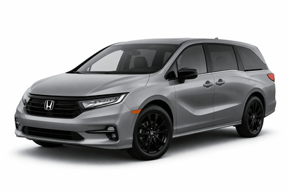 A silver Honda Odyssey minivan with black wheels, shown from a three-quarter front angle on a white studio background.