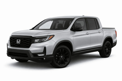 A silver Honda Ridgeduty pickup truck with black wheels and trim, shown from a three-quarter front angle on a clean white background.