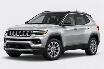 A silver Jeep Cherokee SUV shown from a three-quarter front angle on a light gray studio background.