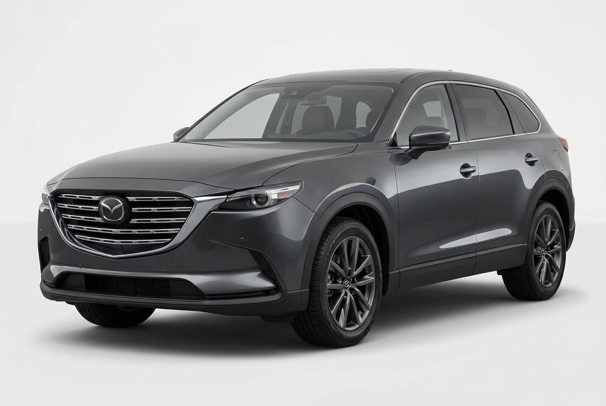 Mazda CX-9 (2016–2023) shown from a front three-quarter angle on a light studio background.