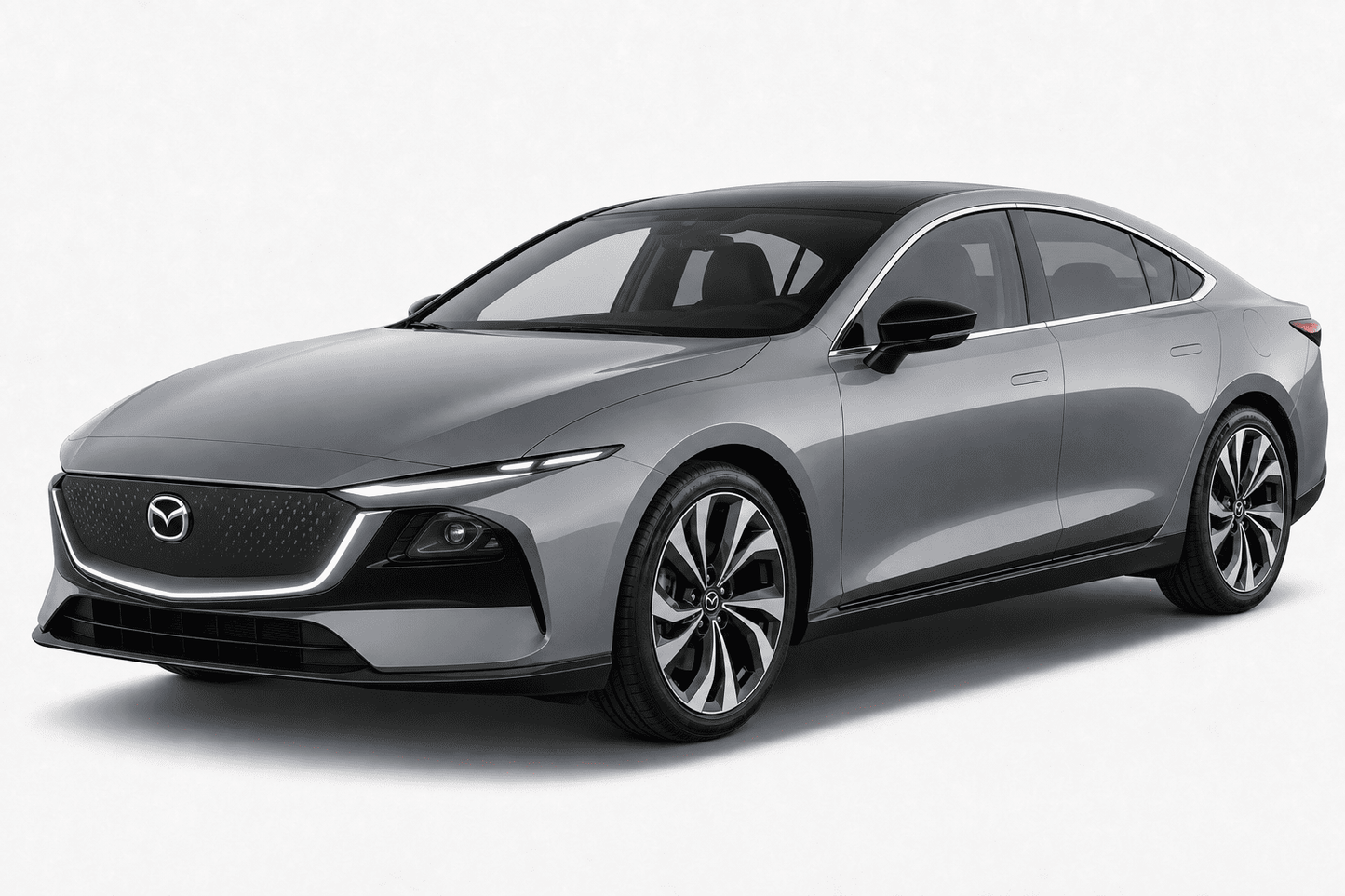 A silver-gray sedan shown at a three-quarter front angle on a clean light gray studio background. The Mazda logo is visible on the front grille, identifying the brand.
