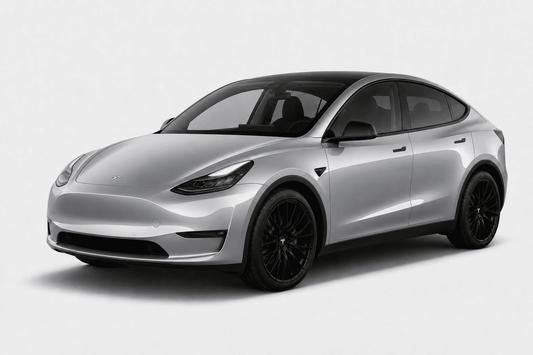 A silver Tesla Model Y with black wheels, shown from a three-quarter front angle against a light gray studio background.