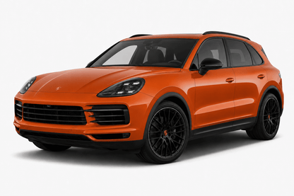 An orange Porsche Cayenne SUV with black wheels and trim, photographed from a three-quarter front angle on a light gray studio background.