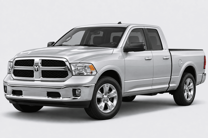 A silver Ram pickup truck shown from a three-quarter front angle on a light gray studio background.