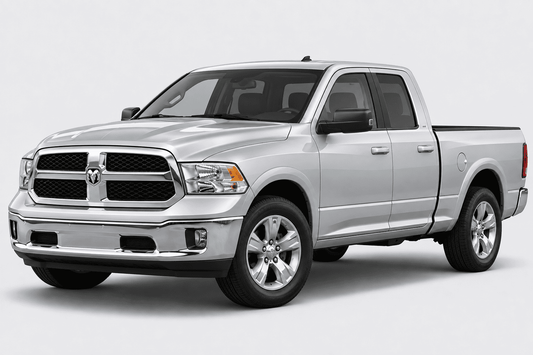 A silver Ram pickup truck shown from a three-quarter front angle on a light gray studio background.