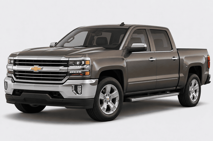A Chevrolet Silverado pickup truck in metallic taupe gray, shown from a three-quarter front angle on a light gray studio background.