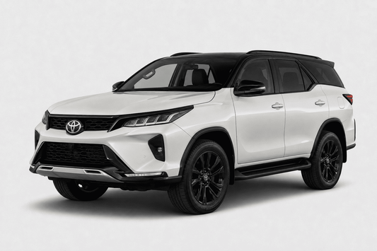 A white Toyota Fortuner SUV with black accents, including the roof, wheels, and trim, shown from a three-quarter front angle on a light gray background.