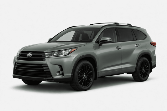 A silver-gray Toyota Highlander SUV with black wheels and roof rails, shown from a three-quarter front angle on a light gray studio background.
