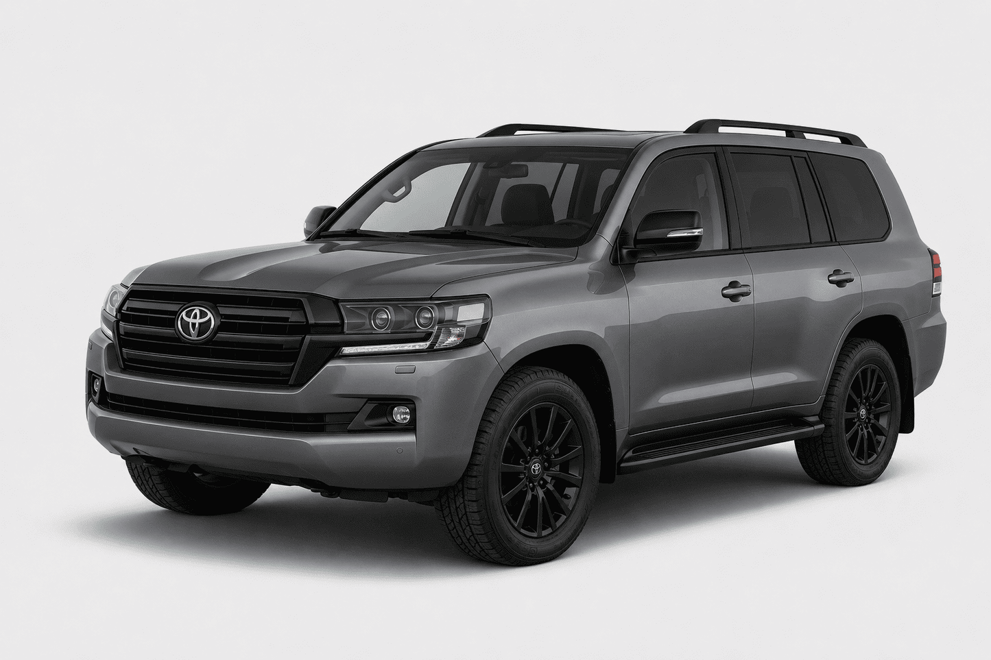 A gray Toyota Land Cruiser SUV with black wheels, black roof rails, and a black front grille, shown from a three-quarter front angle on a light gray background.